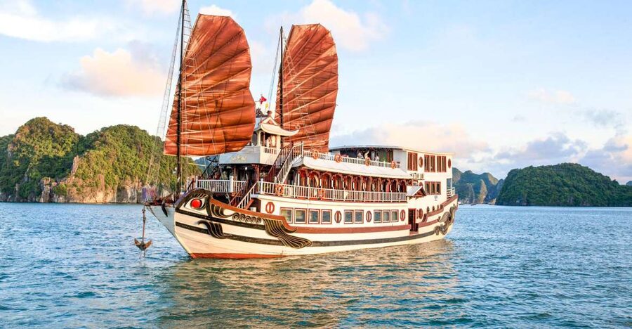 2-Day Royal Palace Ha Long Bay & Ti Top Island Cruise - Day one: limestone islands, kayaking, and Ti Top Island