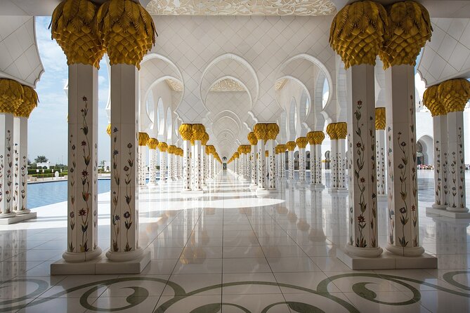 Abu Dhabi City Tour With Presidential Palace Entrance - Guided Tour - The corniche and Breakwater Island are seen from the road
