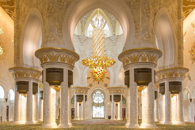 Abu Dhabi Mosque with Qasr Watn and Lunch at Emirates Palace - Guides, photographs, and the human side of the tour