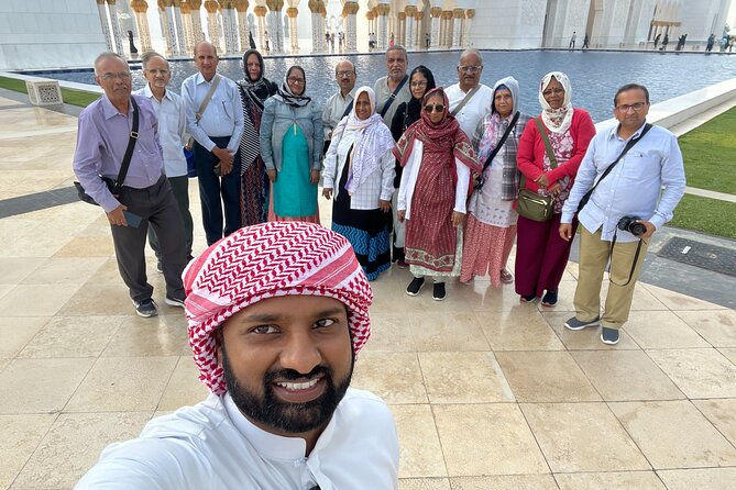 Abu Dhabi Tour Grand Mosque Heritage Village Emirates Palace - Etihad Towers and a famous film stunt