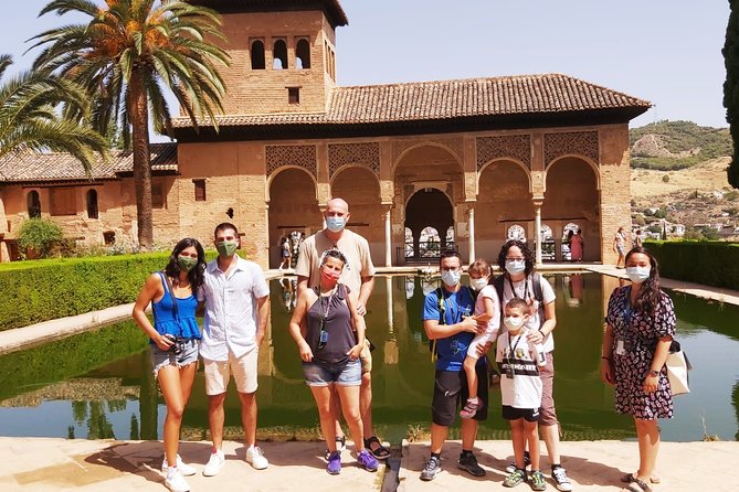 Alhambra, Generalife & Nasrid Palaces Guided Tour in Granada - Walking through the Alhambra grounds