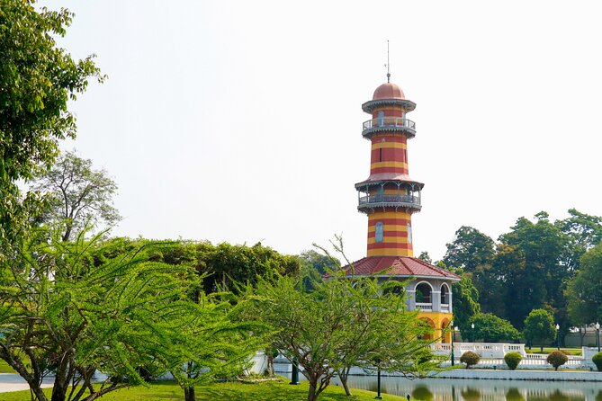 Ayutthaya Summer Palace and Temples Day Tour from Bangkok - Wat Mahathat and the Buddha head in the roots