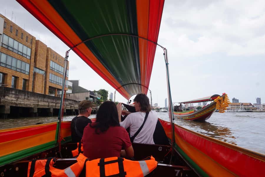 Bangkok: Grand Palace, Wat Pho & Long Tail Boat Tour - Entering the Grand Palace and Wat Phra Kaew