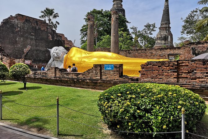 Bangkok: Private Ayutthaya and Bang Pa-In Summer Palace Tour - Walking through Ayutthaya’s old capital