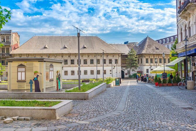 Bucharest one day tour with Parliament Palace and Village Museum - From communist office blocks to the Romanian Athenaeum
