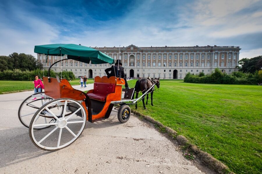 Campania: Royal Palace of Caserta Guided Private Tour - Meeting under the flags at Piazza Carlo di Borbone