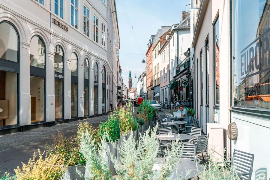 Copenhagen City & Christiansborg Palace Private Walking Tour - Kongens Nytorv and the move into old Copenhagen