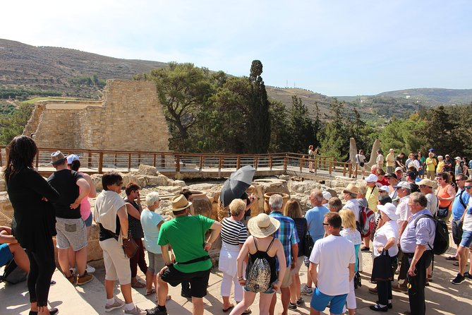 Crete Minoan Discovery Tour with Knossos Palace, Heraklion, and Live Dance Show - Walking into the Palace of Knossos