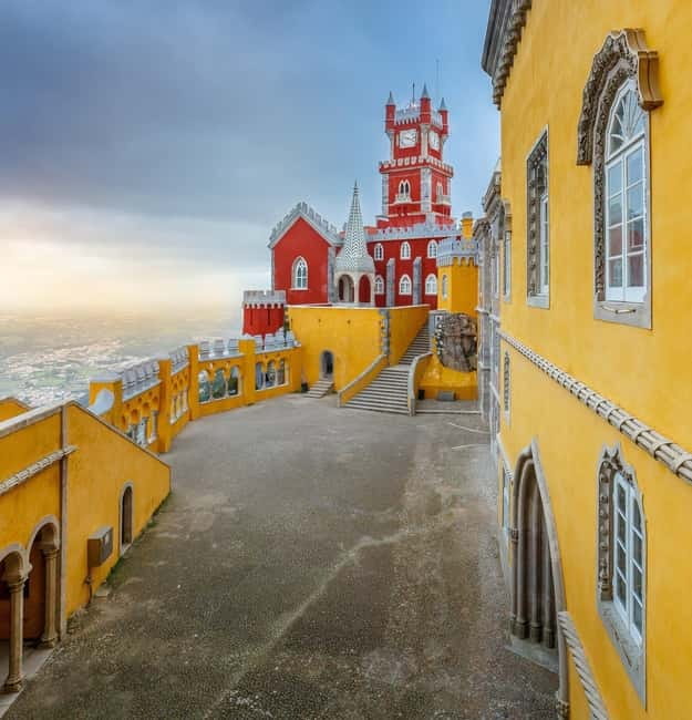From Lisbon: Sintra and Estoril Trip with Pena Palace Entry - Pena Palace and the mountain setting