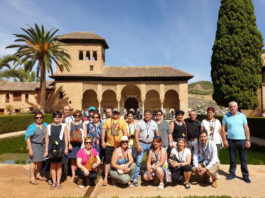 Granada: Alhambra, Nasrid Palaces, & Generalife Guided Tour - Charles V Palace adds a sharp contrast