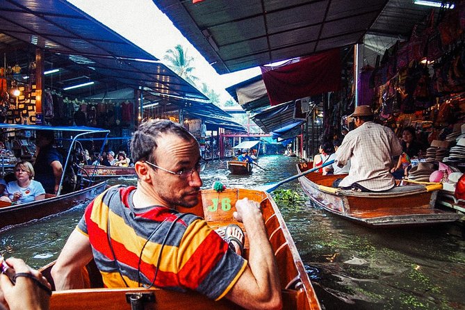 Grand Palace, Damnoen Floating Market & Maeklong Railway Market Tour – Full Day - Damnoen Saduak by boat