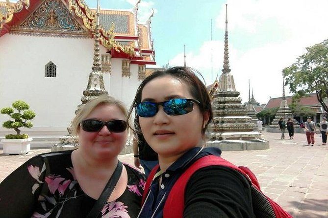 Half-Day Bangkok City Tour with The Grand Palace Private - Walking through the Grand Palace complex