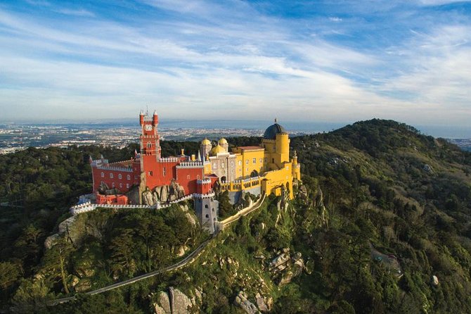 Half-Day Sintra and Pena Palace Tour from Lisbon with Small-Group - Sintra old town, pastry, and cherry liqueur