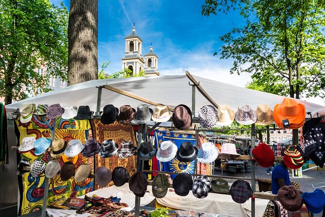 Historic Amsterdam Walking Tour: Royal Palace & Flea Markets - What the guide adds to the walk