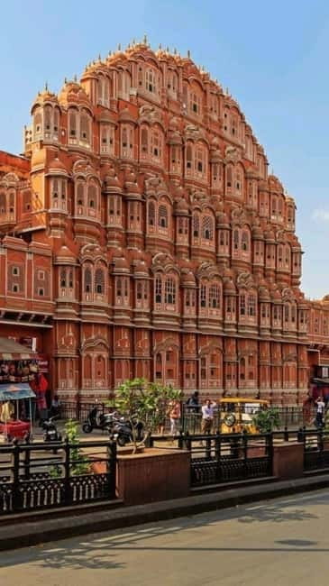 Jaipur: Night Open Jeep Safari with City Lights & Palaces - Jaipur after sunset, with the city lights switched on