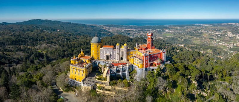 Lisbon: Pena Palace, Sintra, Cabo da Roca & Cascais Day Trip - Pena Palace and its hilltop setting