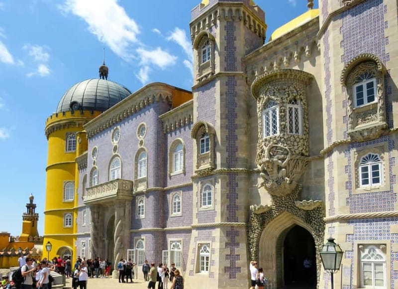 Lisbon: Pena Palace, Sintra, Cabo da Roca & Cascais Day Trip - Pickup in Lisbon and the ride west
