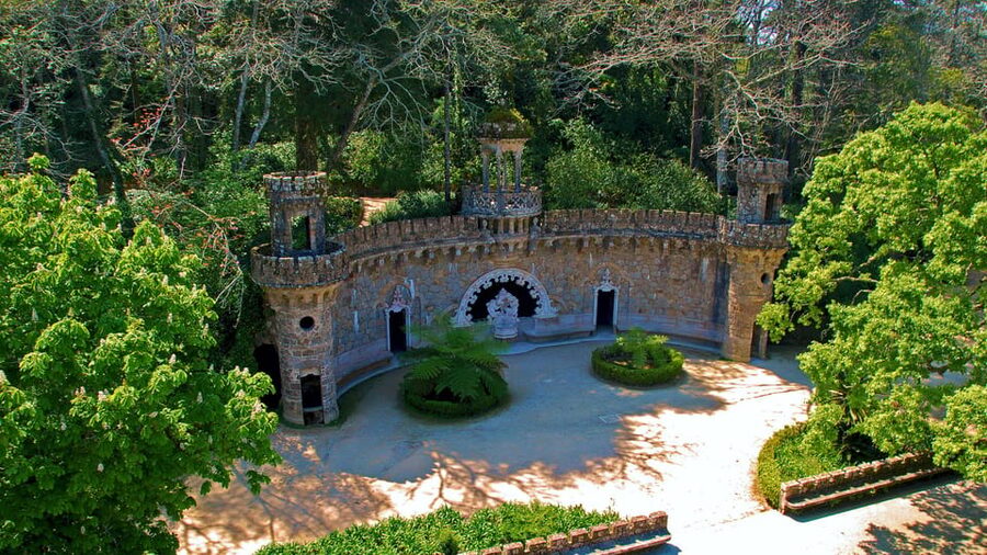 Lisbon: Pena Palace, Sintra, Cabo da Roca, & Cascais Tour - Quinta da Regaleira and the Initiation Well