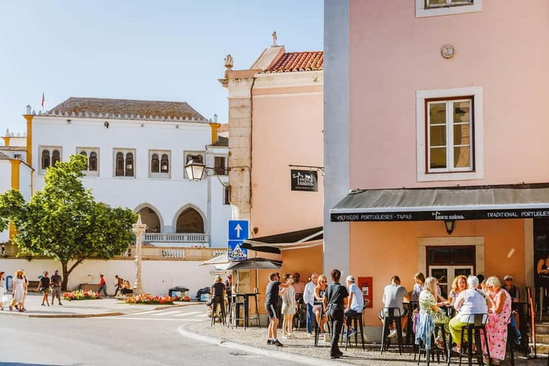 Lisbon: Sintra Cascais & Pena Palace Small Group Tour - A coastal drive past Guincho Beach