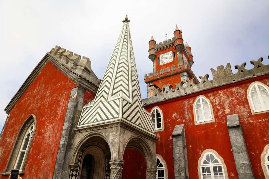 Lisbon: Sintra, Pena Palace, Belém Tour + sunset Boat Cruise - Pena Palace: color, terraces, and royal stories