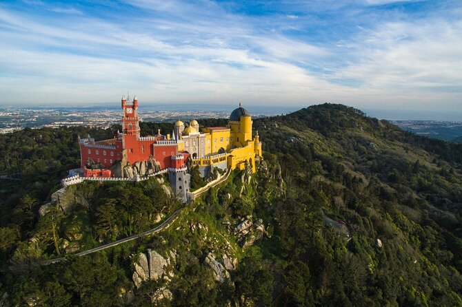 Lisbon: Sintra, Pena Palace, Regaleira, Roca & Cascais Day Tour - Into the Sintra Mountains by small vehicle
