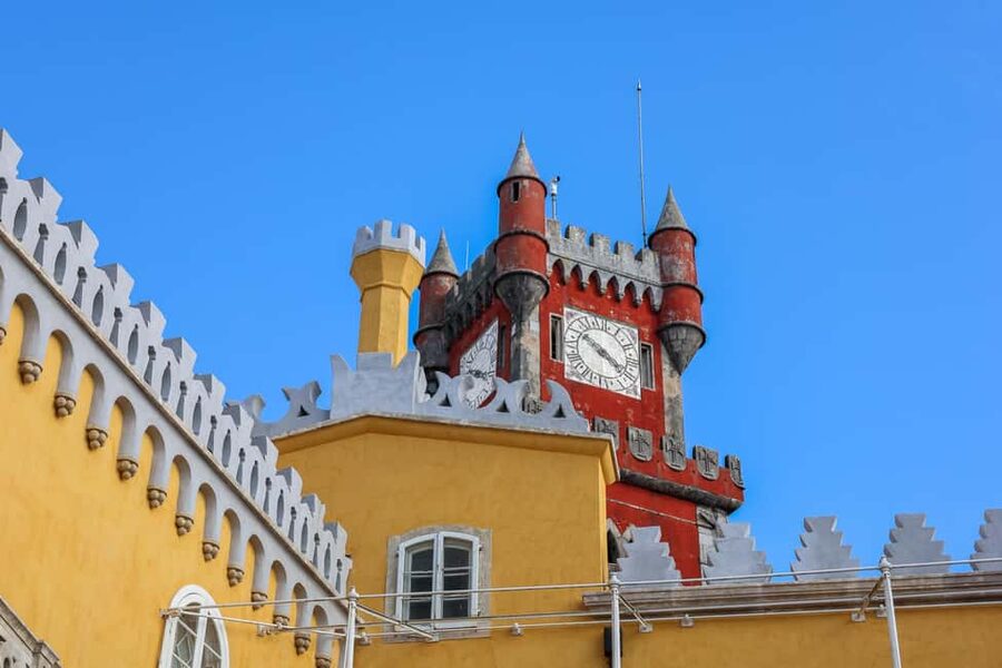 Lisbon: Sintra, Pena Palace & Wine Tasting Small-Group Tour - Pena Palace and gardens: colorful, steep, and worth the effort
