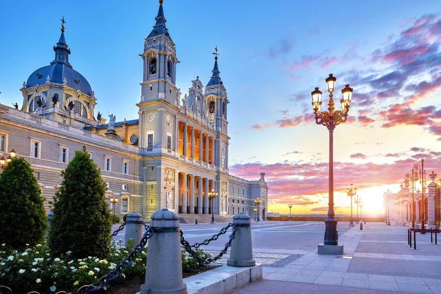 Madrid: Afternoon Royal Palace and Almudena Cathedral Tour - Almudena Cathedral and its unusual timeline