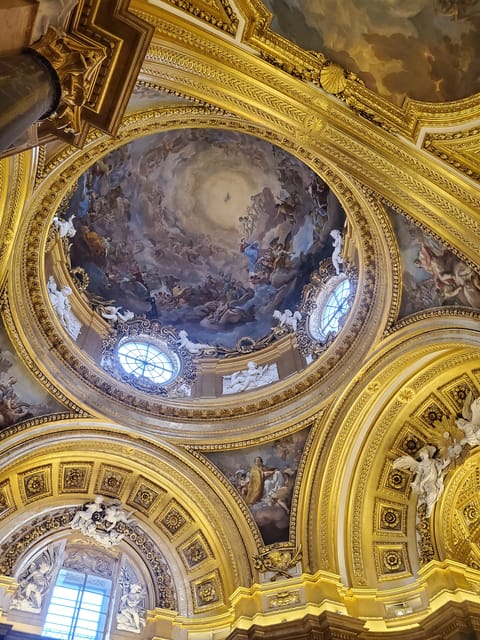 Madrid: Guided visit at the Royal Palace with tour guide - Audio equipment helps inside grand rooms