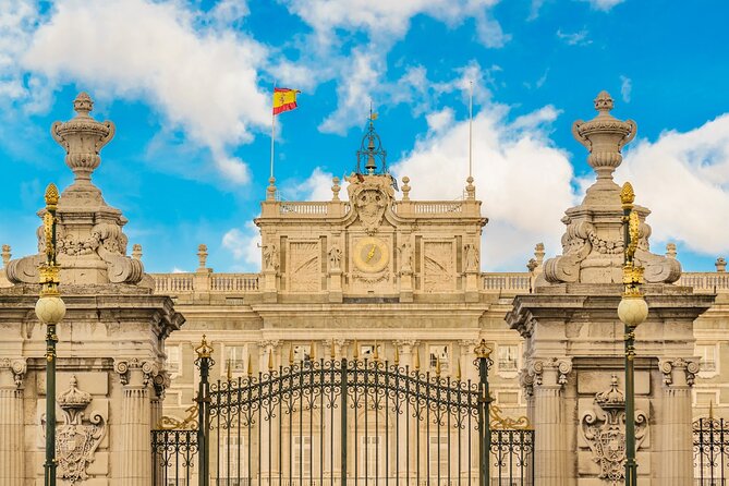 Madrid: Royal Palace Expert Guided Tour with Optional Tapas - Following the guide through the royal rooms