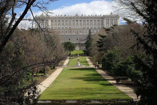 Madrid: Royal Palace Guided Tour with Skip the Line Ticket - Meeting at Madrid Souvenirs on Carlos III Street