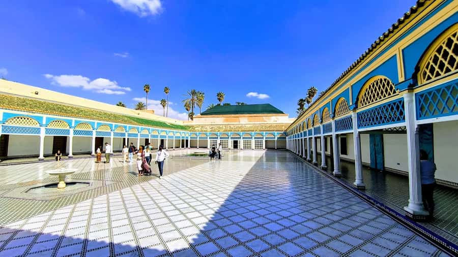 Marrakech: Bahia Palace, Saadian Tombs & Top Highlights Tour - Tinsmiths Square, Bab Agnaou, and the changing streets
