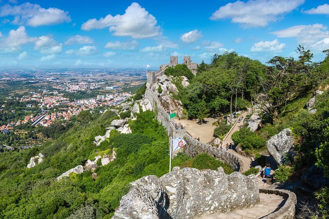 Private Half Day Tour to Sintra and Pena Palace from Lisbon - Moorish Castle: stone walls and steep views