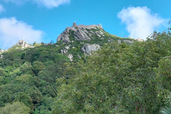 Private Tour Sintra, Palaces and Mountain Tuk Tuk(2 to 6 people) - Passing the Moorish Castle walls