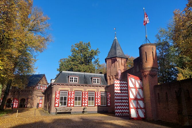 Private Tour to Royal Palace & Castle de Haar from Amsterdam - Castle de Haar and its remarkable reconstruction