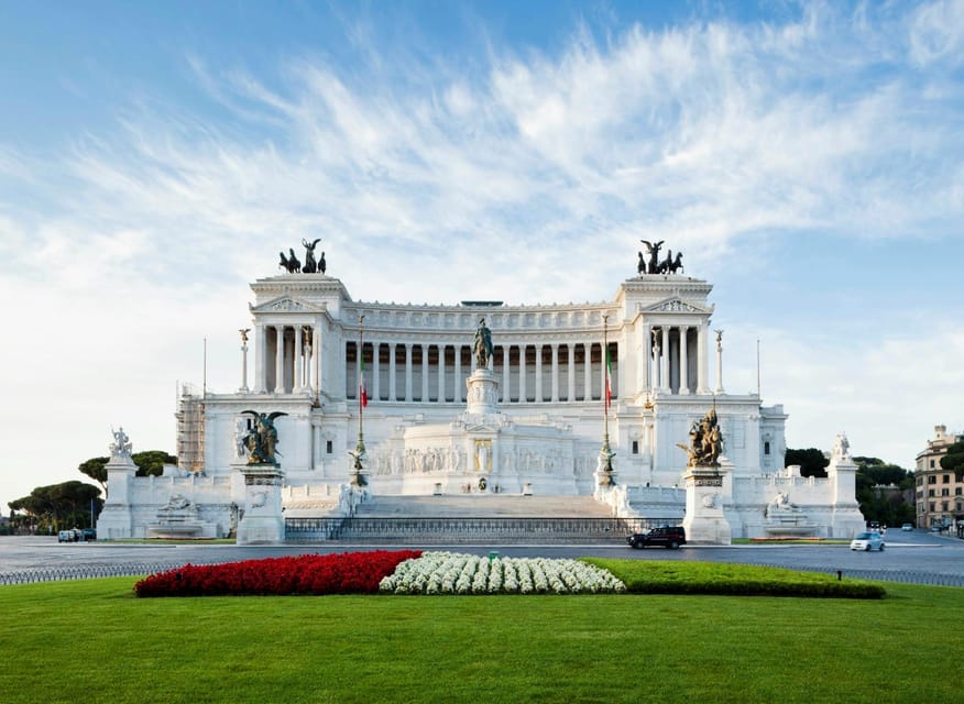 Rome: Vittoriano with Rooftop & Palazzo Venezia Hosted Entry - Taking the elevator above Rome