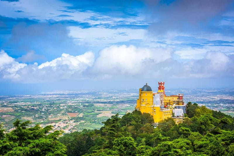 Sintra Hike: Past palaces and hidden paths. - The Mediterranean villa and the broad coastal view
