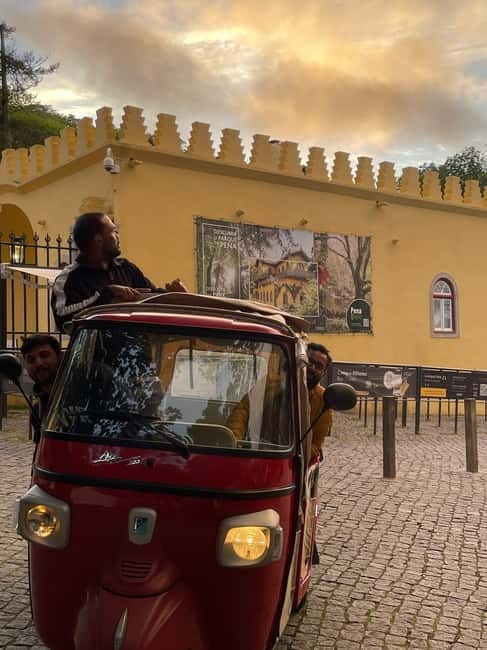 Sintra: Pena Palace and Park Entry Ticket with Tuk Tuk Ride - The ride through Sintra
