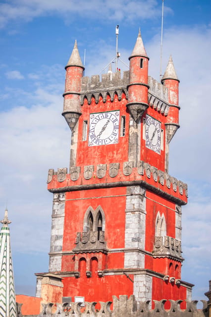 Sintra: Pena Palace, National Palace, and Regaleira Tour - Pena Palace Above the Sintra Hills