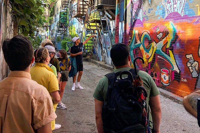 The Original Montreal Mural Arts Tour by Spade & Palacio - The Leonard Cohen mural and the scale of Montreal’s art
