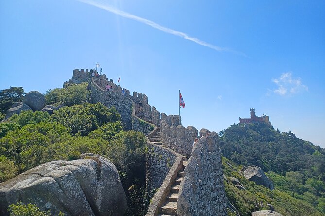 Tuk Tuk Tour Sintra Cascais – Palaces & Coastal Views - Passing through Cascais on the return