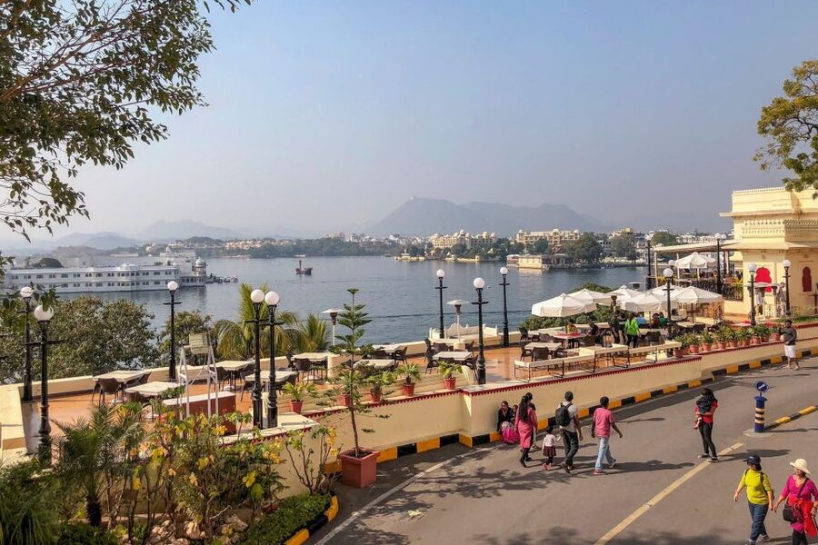 Udaipur: City Palace Museum Tour and Lake Pichola Boat Tour - Taking the shared boat across Lake Pichola