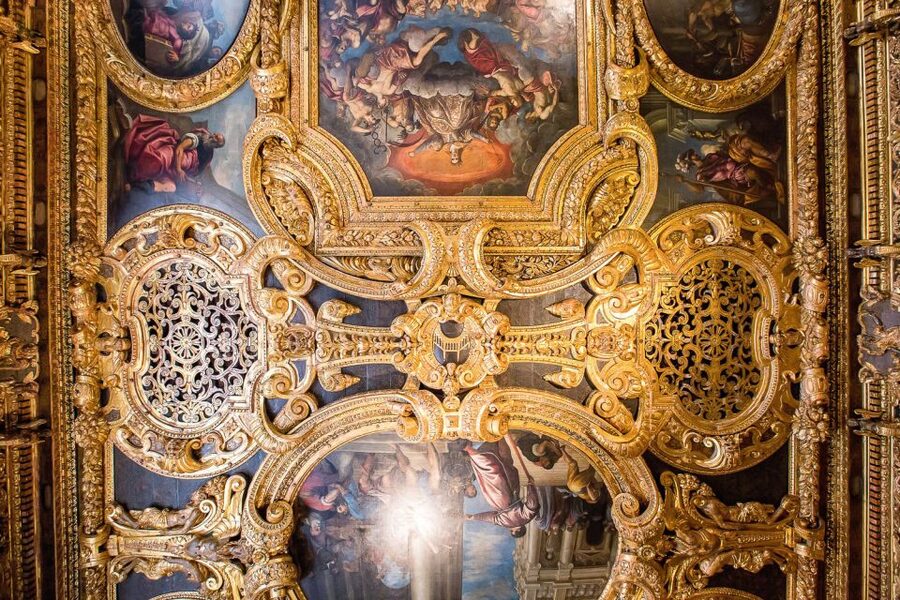 Gilded state room ceiling inside a European royal palace
