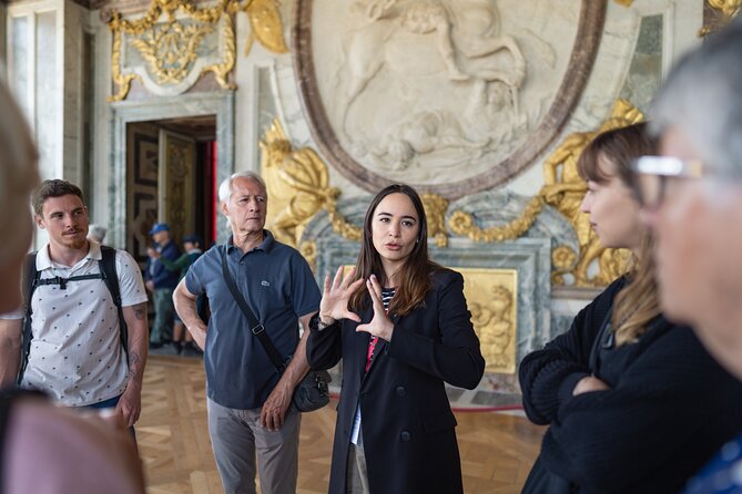 Versailles Palace and Gardens Tour by Train from Paris - Inside Versailles with a guide who tells the human story
