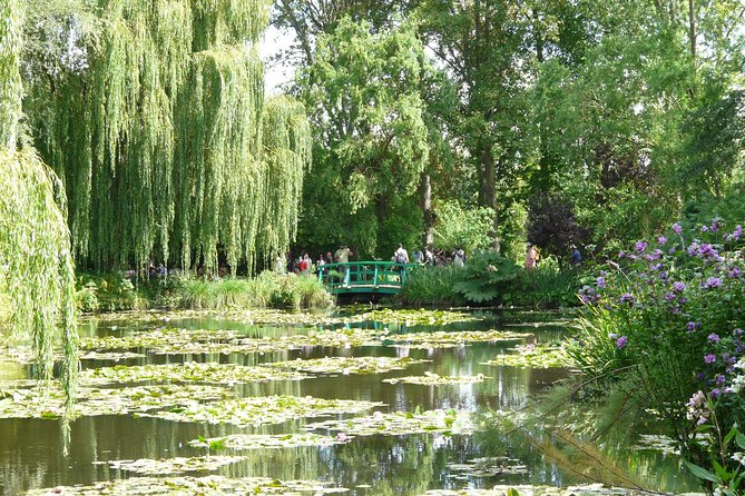 Versailles Palace and Giverny Monet House Visit with Lunch - The coach, group size, and daily pace